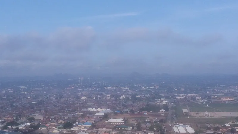 Aerial view over the rooftops of Bauchi, the Bauchi State capital, under a hazy sky