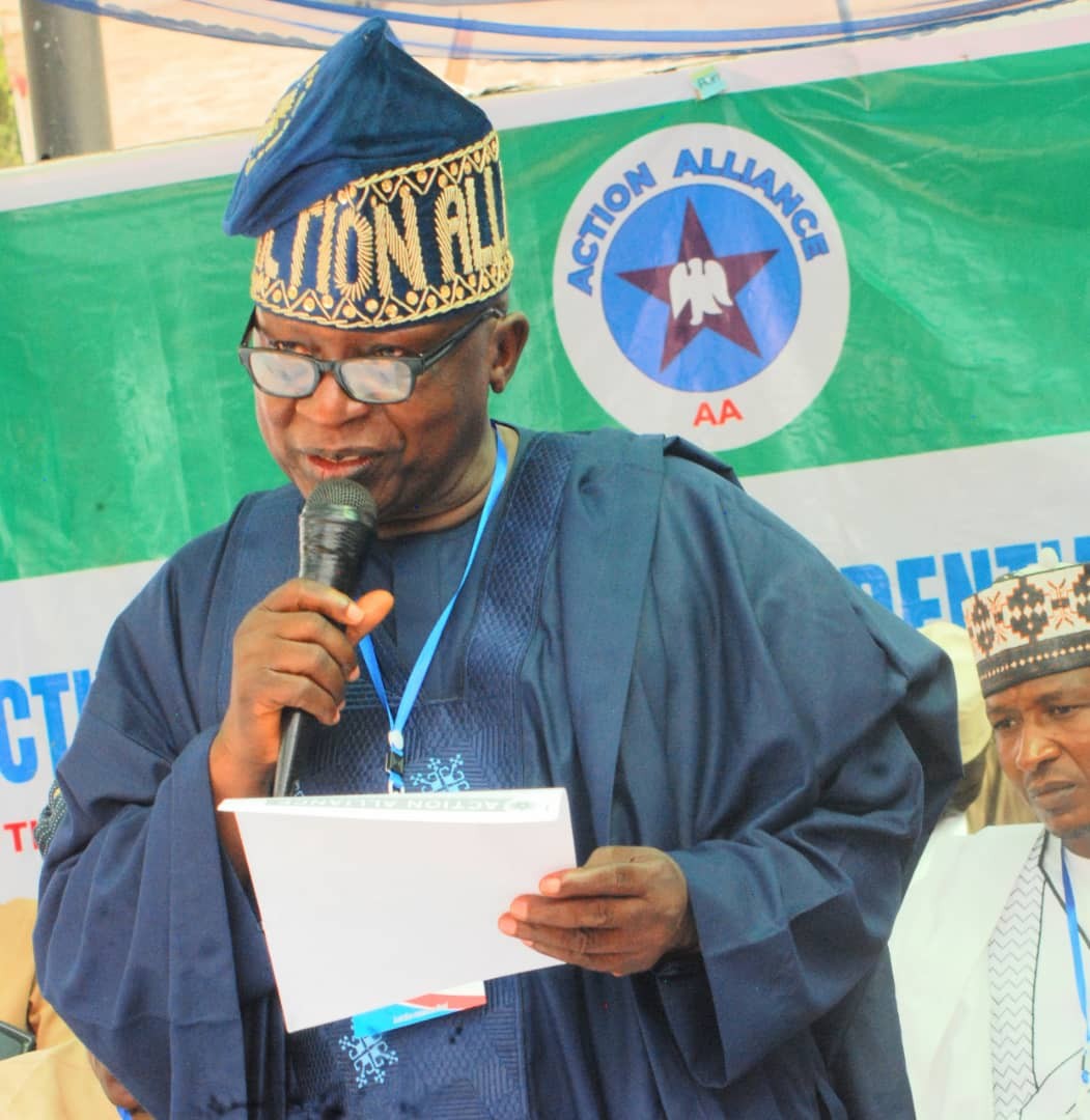 Rufai Omo-Aje, Action Alliance presidential candidate, speaking in front of an Action Alliance banner